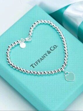 Tiffany & Co.. Blue Enamel Heart Bead In Sterling